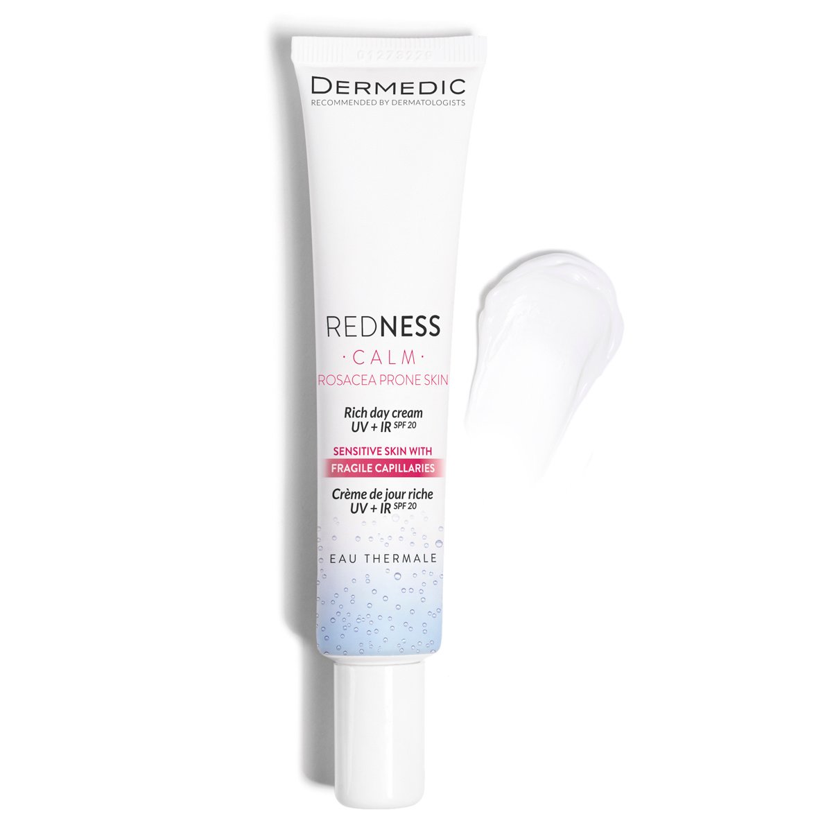 A white tube of Dermedic Redness Calm cream for rosacea-prone skin is shown upright with a smear of the cream next to it. The packaging highlights UV protection and suitability for sensitive skin.